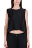 TOP SMANICATO ASSIMMETRICO NERO