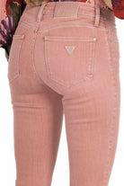 Guess Donna jeans skinny con orlo sfrangiato rosa